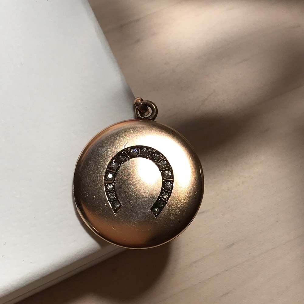 Antique gold filled locket, round with horseshoe crystal design